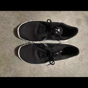 Nike black & white tennis shoe. Like new